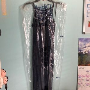 Navy blue jeweled prom dress with slit in the leg